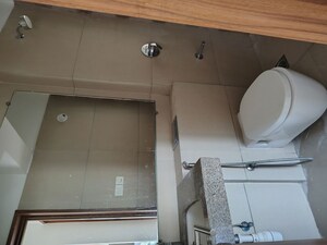 Bathroom in 2 BHK Apartment at Kalpataru Sunrise Grande, Kolshet Road – for Rent