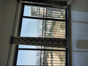 Room in 2 BHK Apartment at Kalpataru Sunrise Grande, Kolshet Road – for Rent