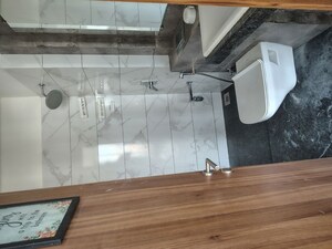 Bathroom in 2 BHK Apartment at Kalpataru Sunrise Grande, Kolshet Road – for Rent