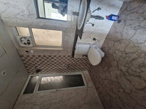 Bathroom in 2 BHK Apartment at Mahagun Mirabella, Sector 79 – for Rent