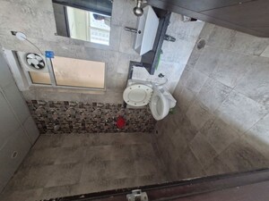 Bathroom in 2 BHK Apartment at Mahagun Mirabella, Sector 79 – for Rent
