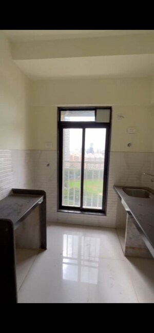 Kitchen in 1 BHK Apartment at Sushanku Avenue 36, Goregaon West – for Rent