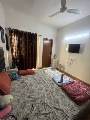 Bedroom in 2.5 BHK Apartment at Nimbus The Golden Palm, Sector 168 – for Rent
