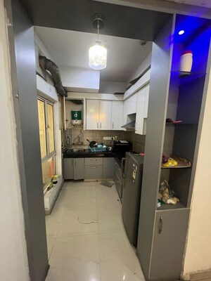 Kitchen in 2.5 BHK Apartment at Nimbus The Golden Palm, Sector 168 – for Rent