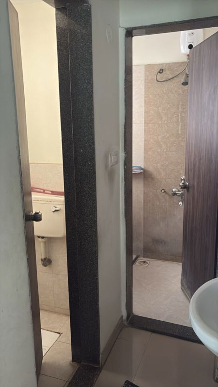Bathroom, wakad 1 Bedroom 480 Sq.Ft. Apartment In Wakad Pune 10269554
