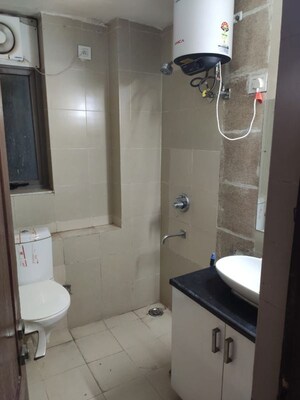 Bathroom in 4 BHK Apartment at Raheja Sampada, Sector 92 – for Sale