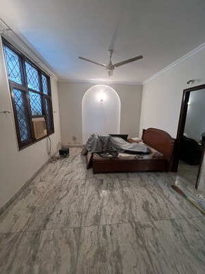 Bedroom in 4 BHK Builder Floor at Panchsheel Enclave – for Sale