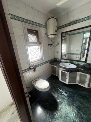 Bathroom in 4 BHK Builder Floor at Panchsheel Enclave – for Sale