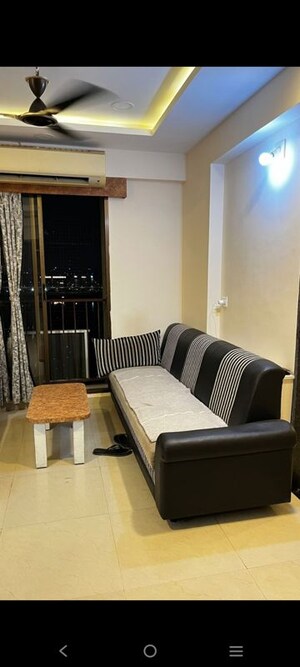 Living Room in 1 BHK Apartment at Applewood Satyesh Residency, Shela – for Rent