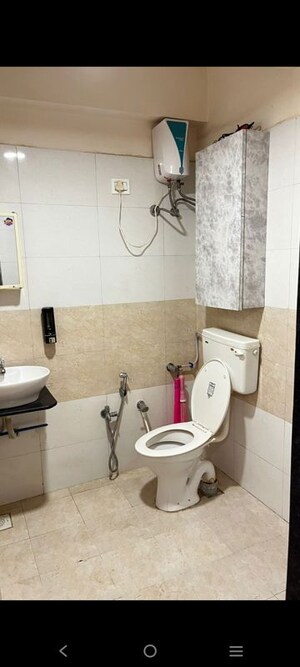 Bathroom in 1 BHK Apartment at Applewood Satyesh Residency, Shela – for Rent