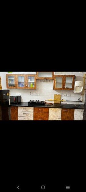 Kitchen in 1 BHK Apartment at Applewood Satyesh Residency, Shela – for Rent