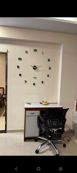 Team Area in 1 BHK Apartment at Applewood Satyesh Residency, Shela – for Rent