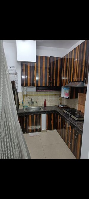 Kitchen in 2 BHK Apartment at Ajnara Grace, Raj Nagar Extension – for Sale