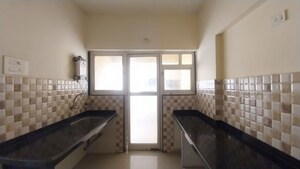 Kitchen in 2 BHK Apartment at Casa Vibrante, Pisoli – for Rent