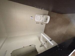 Bathroom in 2 BHK Apartment at Neptune Flying Kite, Bhandup West – for Sale