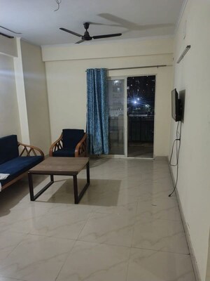 Living Room in 3 BHK Apartment at Aims Golf City, Sector 75 – for Rent