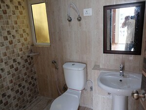 Bathroom in 3 BHK Apartment at Mahagun Mantra I, Sector 10 Greater Noida – for Rent