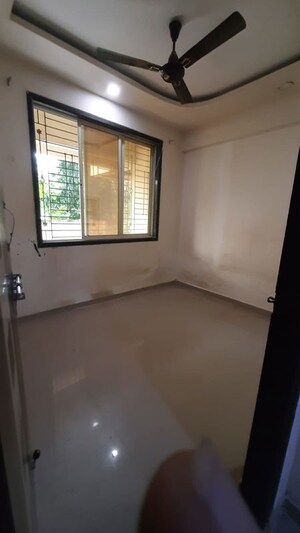 Bedroom in 1 BHK Apartment at Jai Vighnaharta CHS, Kalyan East – for Rent