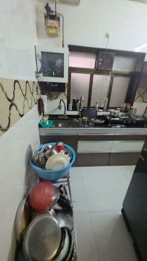 Kitchen in 1 BHK Apartment at Rekhi Sai Blossom, Ghansoli – for Sale