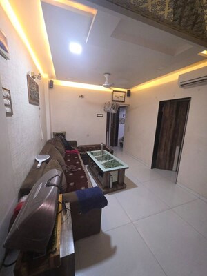 Living Room in 1 BHK Apartment at Rekhi Sai Blossom, Ghansoli – for Sale