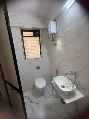Bathroom in 2 BHK Apartment at Mitha Nagar – for Rent