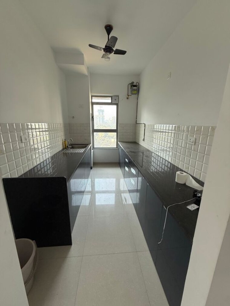 Kitchen, kalpataru-immensa-b 3 Bedroom 1150 Sq.Ft. Apartment In Kolshet Road Thane 10270623