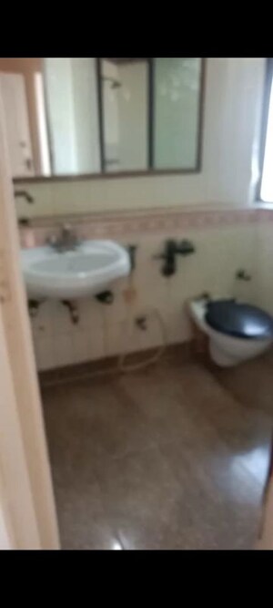 Bathroom in 2 BHK Apartment at Kalpataru Yugdharma, Malad West – for Rent