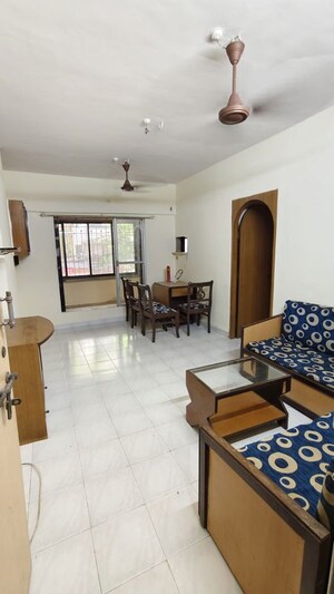 Living Room in 1 BHK Apartment at Gokul Garden CHS, Kandivali East – for Rent