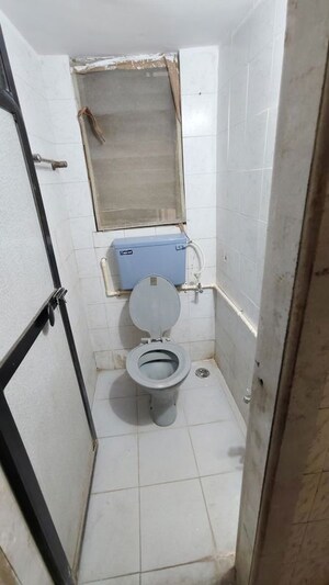 Bathroom in 1 BHK Apartment at Gokul Garden CHS, Kandivali East – for Rent
