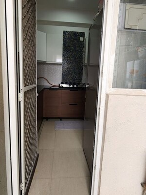 Kitchen in 3 BHK Apartment at Ajnara Gen X, Dundahera – for Sale