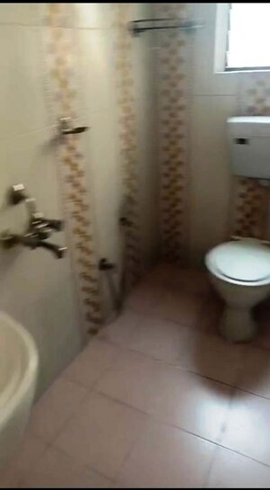 Bathroom in 2 BHK Apartment at Vardhaman Township, Hadapsar – for Rent