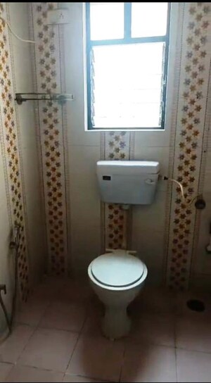 Bathroom in 2 BHK Apartment at Vardhaman Township, Hadapsar – for Rent