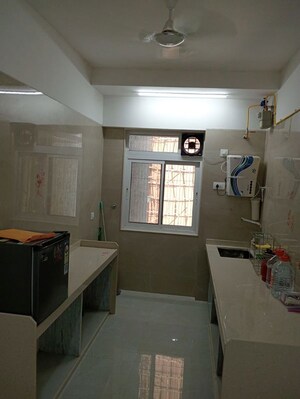 Kitchen in 3 BHK Apartment at Shraddha Elite, Borivali West – for Rent