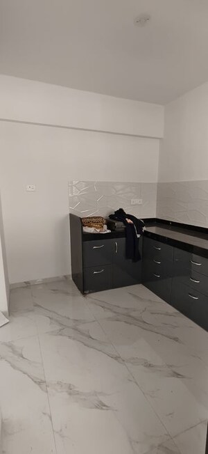 Kitchen in 2 BHK Apartment at Wadgaon Sheri – for Rent