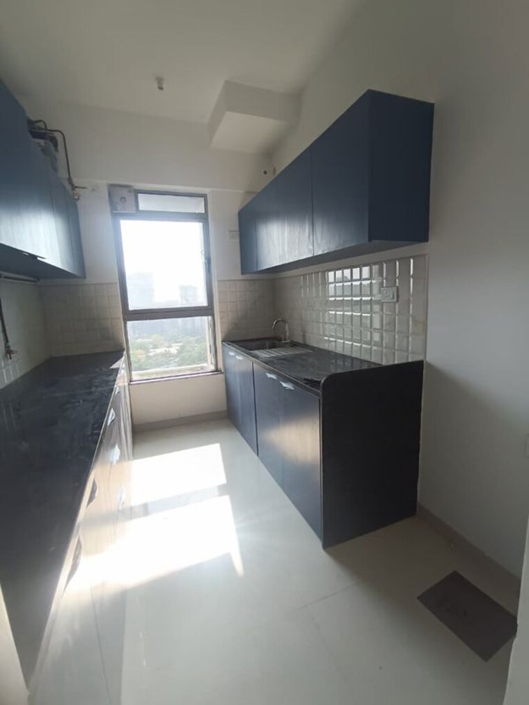 Kitchen, kalpataru-immensa-b 2 Bedroom 598 Sq.Ft. Apartment In Kolshet Road Thane 10272230