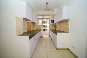 Kitchen in 3 BHK Apartment at MGI Gharaunda, Raj Nagar Extension – for Sale