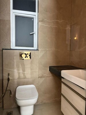 Bathroom in 3 BHK Apartment at Smart World Orchard, Sector 61 – for Sale