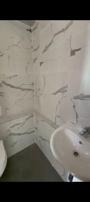 Bathroom in 2 BHK Apartment at Sheth Auris Bliss, Malad West – for Rent