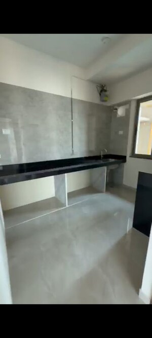 Kitchen in 2 BHK Apartment at Sheth Auris Bliss, Malad West – for Rent