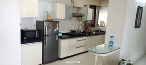Kitchen in 2 BHK Apartment at Amanora Future Towers, Hadapsar – for Rent