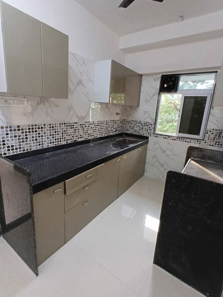 Kitchen, om-heights-malad-east 2 Bedroom 590 Sq.Ft. Apartment In Malad East Mumbai 10273449