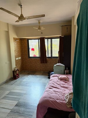 Bedroom in 2 BHK Apartment at Om Heights Malad East, Malad East – for Rent
