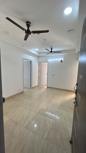 Room in 2.5 BHK Apartment at Paramount Symphony, Sain Vihar – for Sale