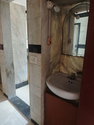 Bathroom in 1 BHK Apartment at Gokuldham Complex, Goregaon East – for Rent
