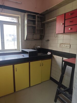 Kitchen in 1 BHK Apartment at Gokuldham Complex, Goregaon East – for Rent