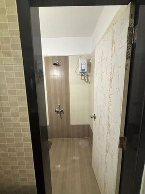 Bathroom in 1 BHK Apartment at Hyde Park CHS, Kharghar – for Rent