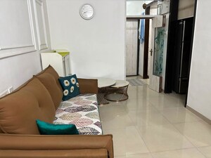 Living Room in 1 BHK Apartment at Hyde Park CHS, Kharghar – for Rent