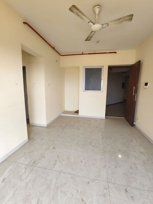 Living Room in 1 BHK Apartment at Vijay Orovia, Ghodbunder Road – for Rent