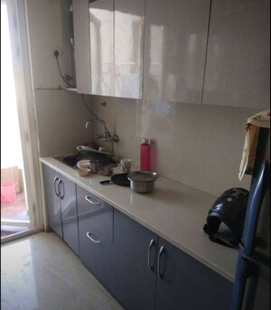Kitchen in 2 BHK Apartment at Omega Windsor Greens, Faizabad Road – for Rent