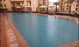 Swimming Pool in 2 BHK Apartment at Omega Windsor Greens, Faizabad Road – for Rent